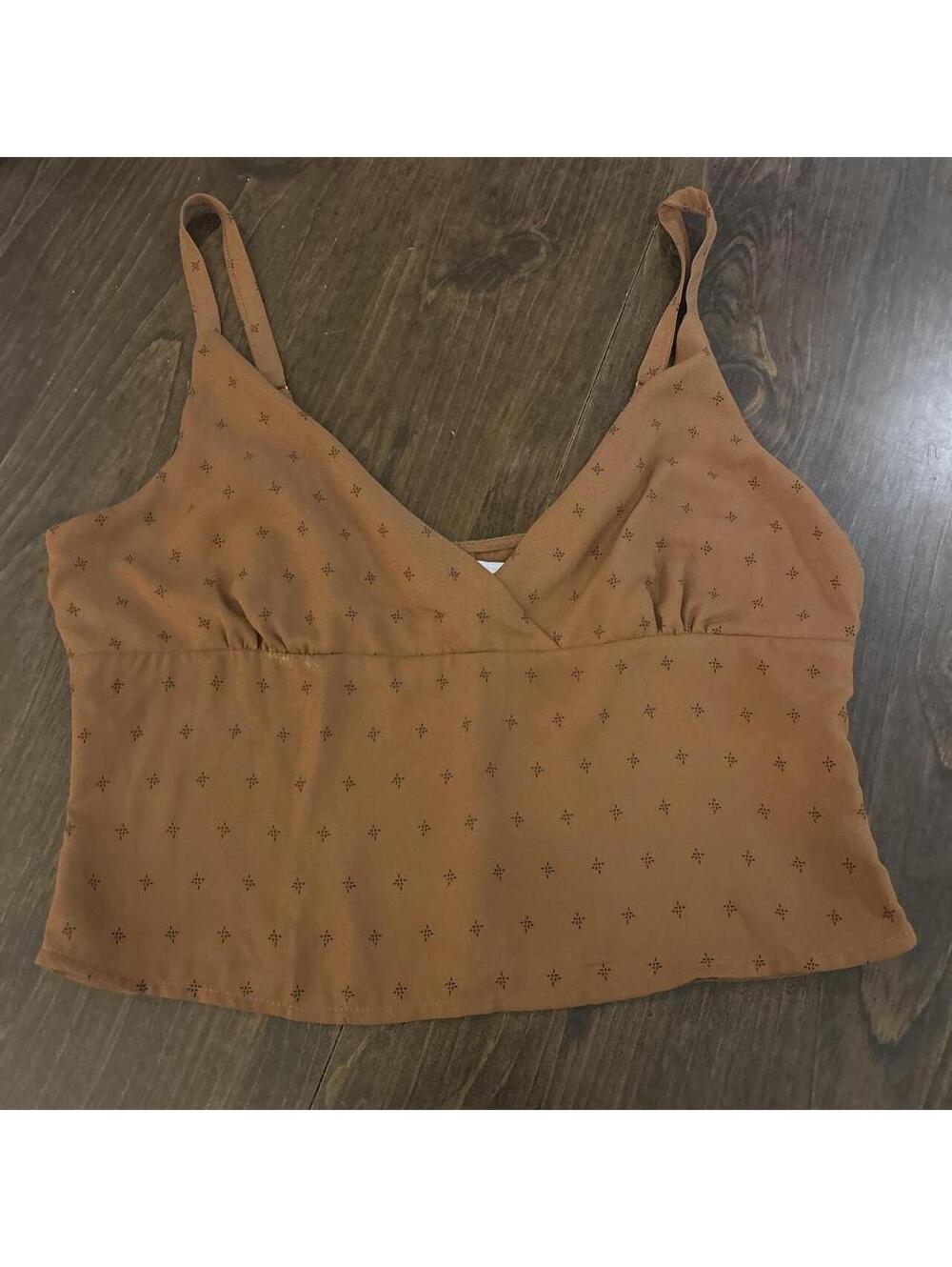 Dainty Hooligan brown crop top with small dark star-like motifs #dainty #stars